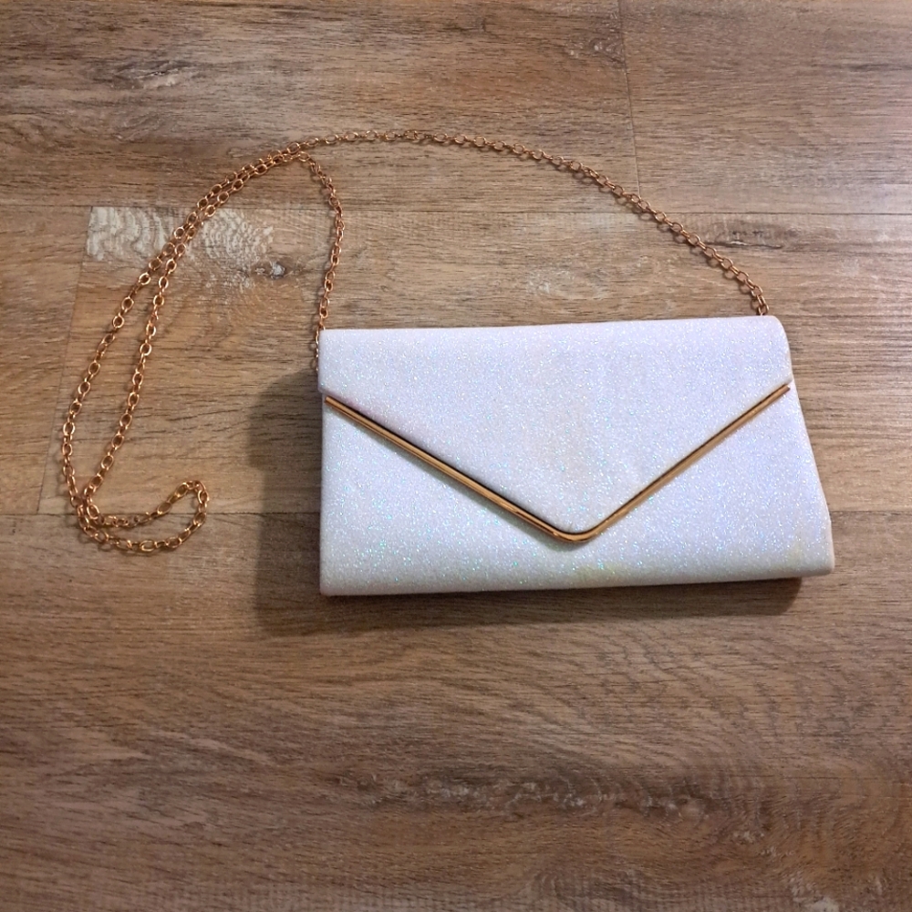 Elegant White Clutch with Gold Chain